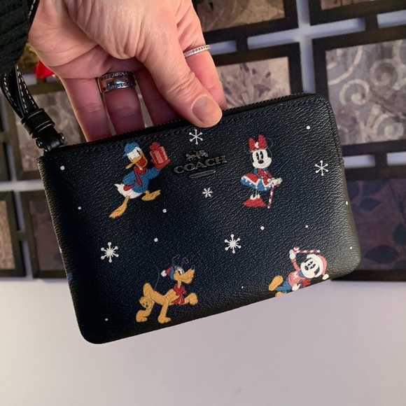 Authentic COACH Signature Coated leather Disney Xmas print zip top wristlet - Picture 11 of 16